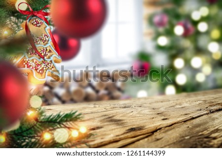Wooden old table in the world with a Christmas tree and baubles