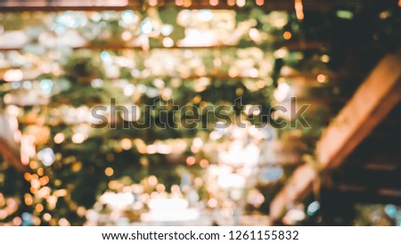 Abstract photo glitter vintage bokeh blurred and filtered defocus background.