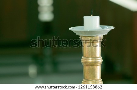 Selective focus of used candle decorations in wedding ceremony in church with copy space for text or message