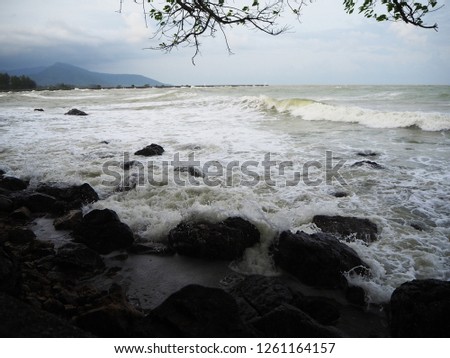 Coastal wave The sea in Nakhon Si Thammarat province in the rainy season.