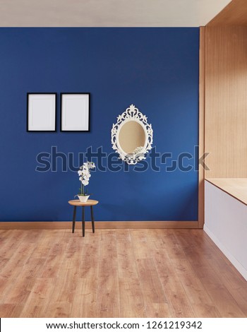 Dark blue wall interior, mirror lamp and furniture armchair with frame and picture. Wooden detail and brown parquet.