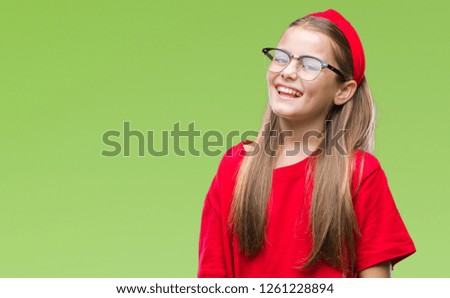 Young beautiful girl wearing glasses over isolated background looking away to side with smile on face, natural expression. Laughing confident.