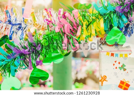 Colorful tinsel and gift decoration for a  Christmas tree and a happy new year