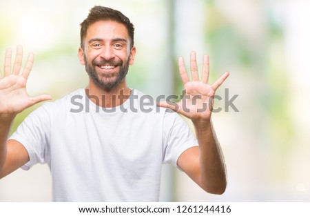 Adult hispanic man over isolated background showing and pointing up with fingers number ten while smiling confident and happy.