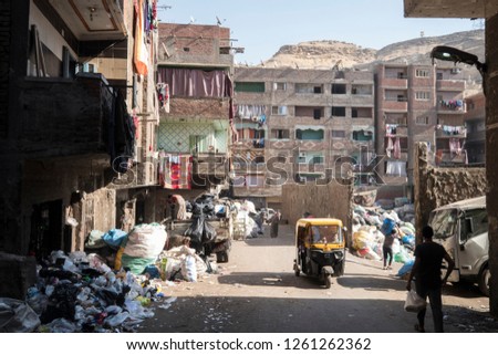 Street photography of street in Manshiyat Naser - also noun trash City - in cairo egypt Royalty-Free Stock Photo #1261262362