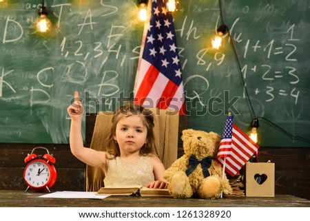 Tutor will require child to learn specific skill before advancing to level. Children must be taught how to think not what to think. Group four happy people having waving American flag.