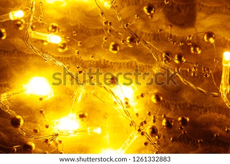 Christmas and New Year decorations, yellow lights background