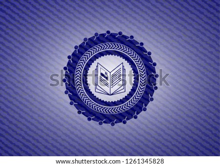 book icon inside badge with jean texture