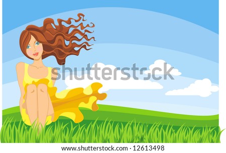 Young woman sitting on the grass