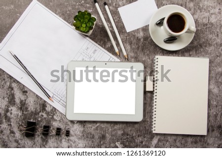Template mock up desk mockup with computer keyboard, tablet drawing business idea empty envelope, notebook and cup of coffee in gray background. View from above. Layout of bisnes ideas. Layout for the