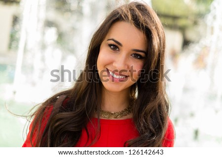 Beautiful young multicultural woman outdoor portrait. Royalty-Free Stock Photo #126142643