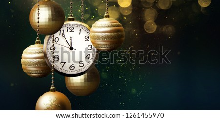 New Year is coming. Vintage clock and christmas decorations.
