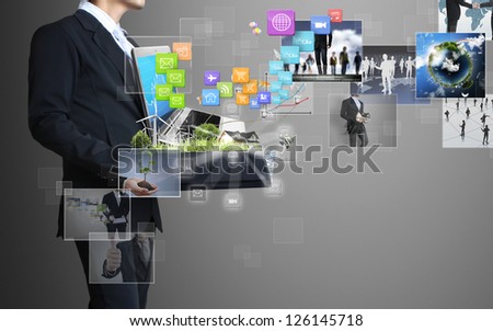 Businessman with laptop in his hands