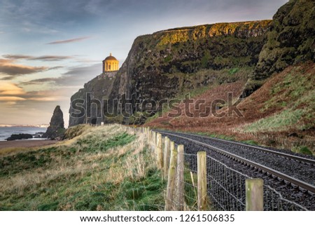 This is a picture of the railtracks that run along the Antrim Coast.  In the distance you can see Mussenden Temple on the edge of the cliff