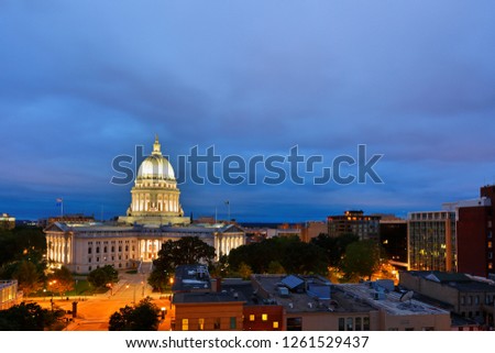Bird's eye view of the Wisconsin state capital before sunrise.  The building houses both chambers of the Wisconsin legislature along with Wisconsin Supreme Court .
