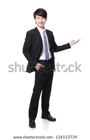 Young handsome Business man presenting in full length isolated over a white background, asian male model