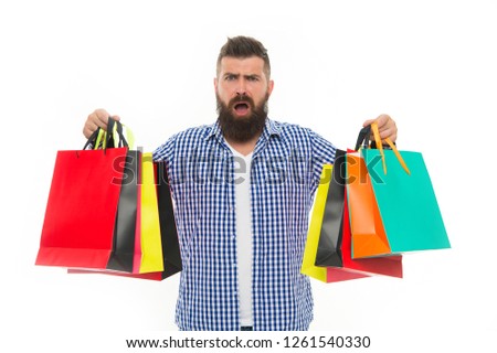 Black Friday. Nice purchase. Cyber Monday. Shopping sale. Male barber care. Mature hipster with beard. Bearded man with shopping bags.. brutal sad caucasian hipster with moustache.