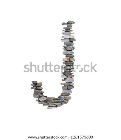 Font of J to create from stone wall isolated on white background with clipping paths.