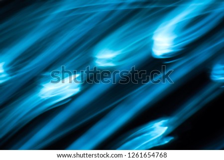 Energetic blue blurred background of cold light, photo