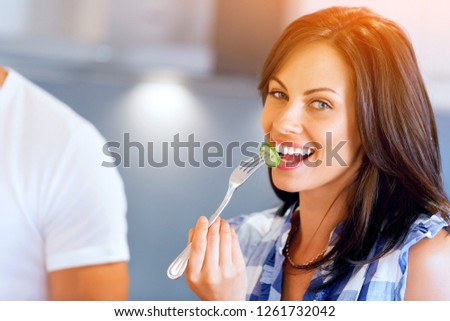 Young woman with a fork