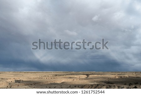 Stormy clouds over a desert landscape in southern Utah -Image