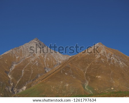 Landscape picture. Caucasian mountains against the sky