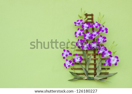 orchid flower bouquet decorated on green wall with free space area