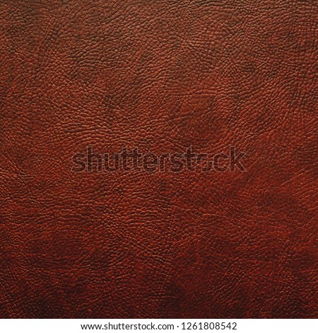 Elegant stylish dark brown bumpy leatherette background. Seamless square texture. Element for interior. Free space for text or advertisement.