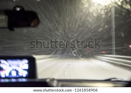 highway, driving at night during the blizzard