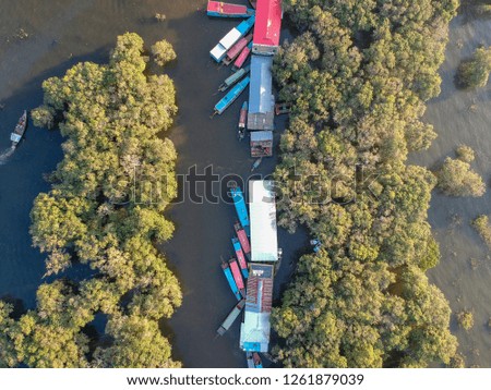 Aerial view of boats on a cambodian lake