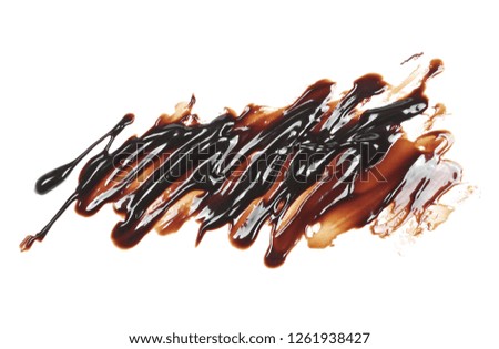 Melted chocolate for topping isolated on white background, top view