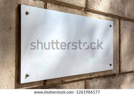 Mock up view of a plate metal sign 