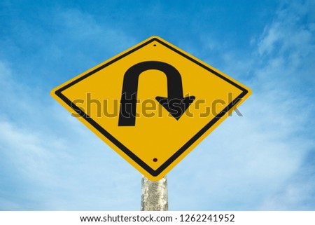 u turn traffic  sign  with blue sky background
