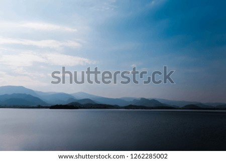 view mountain with river, blue sky Royalty-Free Stock Photo #1262285002
