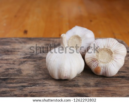 Garlic clove on wooden table background,copy space. 