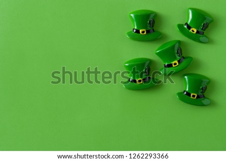 St. Patrick Day symbols on green background. Copyspace
