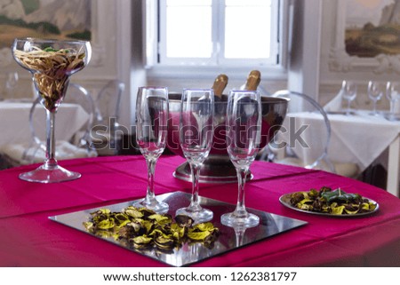 The Beautiful and Festive Table Setup for Three with Champagne