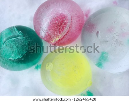 Colored ice globes