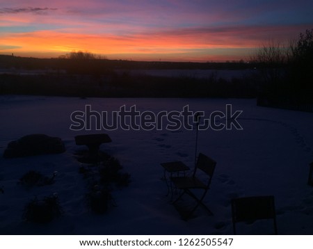 early morning sunrise with a covering of snow.