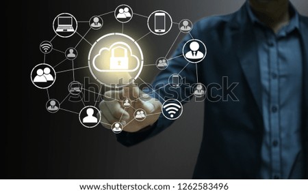Businessman pressing icon for security Internet online business (concept pointing security services)