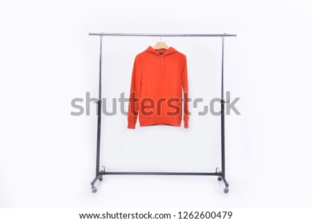 Red sports warm jacket clothes on hanger-
