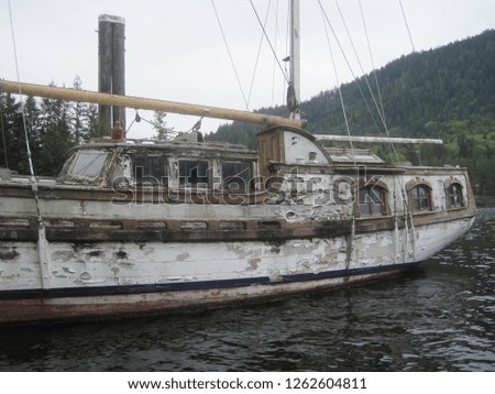 Derelict boat with schooner type rigging and an interesting combination of modern and old school features. The condition is somewhere between bad and beyond repair. It still floats which is surprising