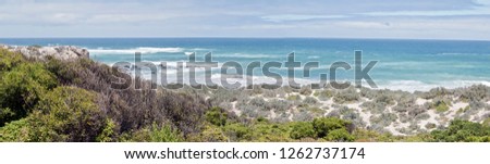 this is a landscape of the dunes at seal bay on Kangaroo Island.  It was a cold windy day with rough seas