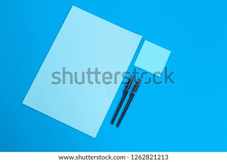 mock up concept. cards Papers on blue  background. Top view, flat lay, copy space