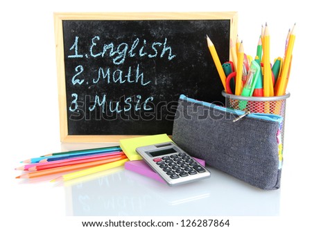 pencil box with school equipment and timetable isolated on white