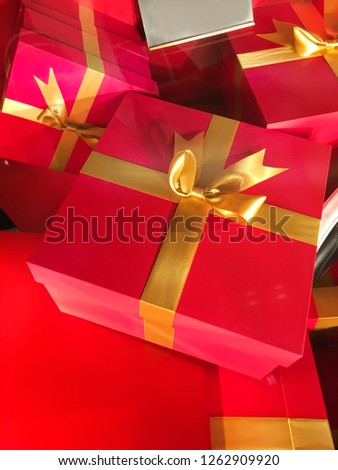 pile of red gift boxes
