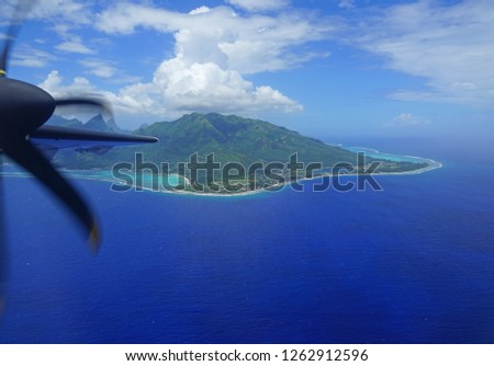 Aerial view of the island and lagoon of Moorea near Tahiti in French Polynesia, South Pacific