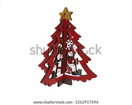 A little wooden Christmas tree for decoration in Christmas festival in white background. Sign and holiday concept.