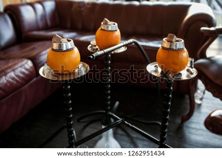 hookah, the bowl is made of orange
