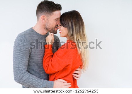 Beautiful young couple in love, kissing and hugging each other. Romantic relationship.